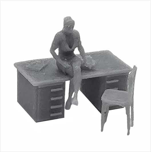 OO Scale Woman Sitting On Desk